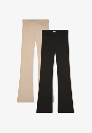 Due coppie di leggings a campana, una beige e una nera. Realizzati in un tessuto morbido con una vita alta e un design a incrocio sul davanti.