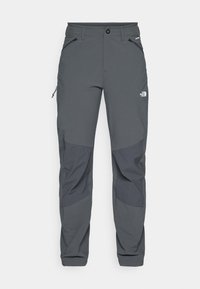 Mørkegrå utendørsbukser med forsterkede kneputer, glidelås i sidelommer og frontlommer, knappelukking, og The North Face-logo på låret.