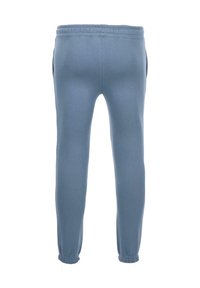 Lyseblå sweatpants med elastisk talje, sidelommer og elastiske manchetter ved anklerne. Blødt, glat stof med en ensfarvet farve.