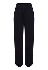 Černé, volné kalhoty vyrobené z měkkého materiálu. Mají široký pas a elastické manžety na kotnících. Žádné viditelné vzory nebo akcenty.