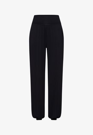 Pantaloni neri, larghi e comodi, realizzati in materiale morbido. Presentano una vita ampia e polsini elasticizzati alle caviglie. Nessun motivo o accento visibile.