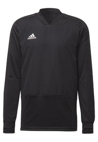 Camiseta deportiva negra de manga larga con escote en V, hecha de una tela suave. Presenta el logo blanco de Adidas y tres rayas blancas en las mangas.