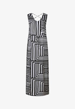 Robe maxi sans manches avec motif géométrique en noir et blanc, col en V, bretelles croisées dans le dos et ceinture à nouer à la taille.