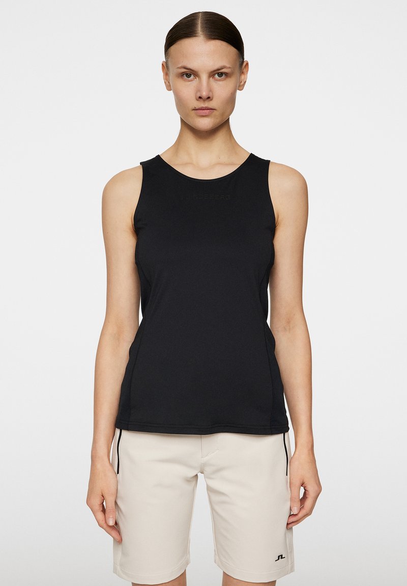 Svart ärmlös atletisk tank top tillverkad av mjukt, stretchy tyg med rund halsringning och subtil logotyp framtill.