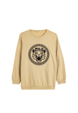 Beige huppari, jossa on pyöreä kaula-aukko ja pitkät hihat. Sisältää mustan tiikeri-graafin, jossa on "WILD"-teksti ympyrämuodostelmassa. Pehmeä, minimaalinen pinta.
