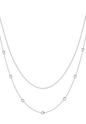Two delicate silver necklaces, one plain thin chain and one beaded chain with evenly spaced silver beads.