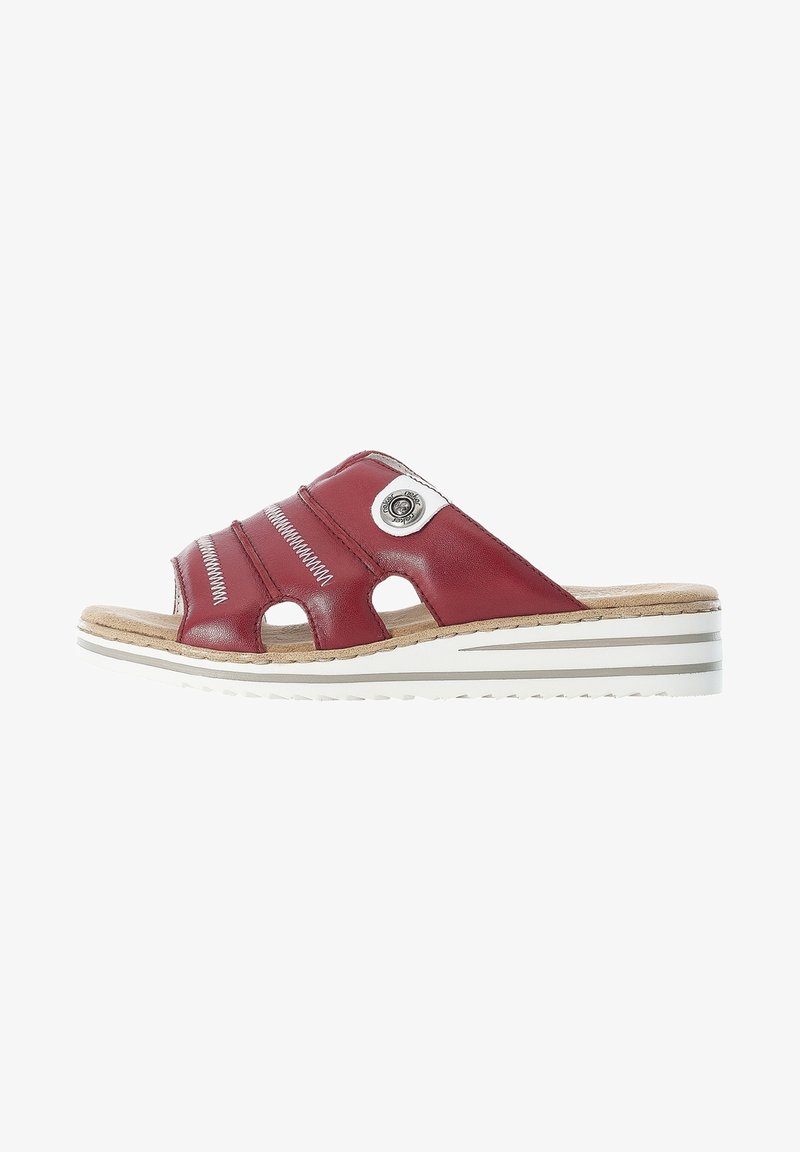 Red leather slide sandal with three curved straps, open toe, and circular metal accent. Features a textured cork footbed and white striped sole.
