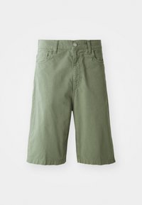 Green cotton shorts with a loose fit, featuring two front pockets, a button fastening, and a mid-calf length. Smooth texture.