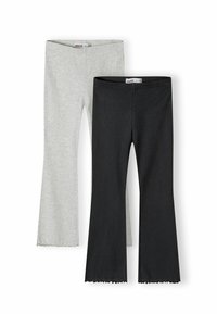 Zwei Paar Rippstoff-Hosen, eine in hellgrau und eine in schwarz, mit leichtem Schlag und Ziernähten am Saum.