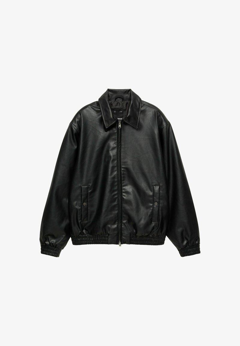 Veste zippée noire en faux cuir avec col, deux poches latérales à boutons-pression, poignets et taille élastiques.