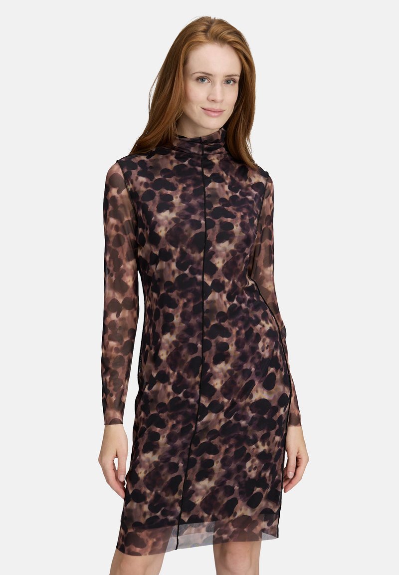 Langärmliges, durchsichtige Kleid mit einem braun-schwarzen gepunkteten Muster, hohem Kragen und taillierter Silhouette, mit einem knielangen Saum.