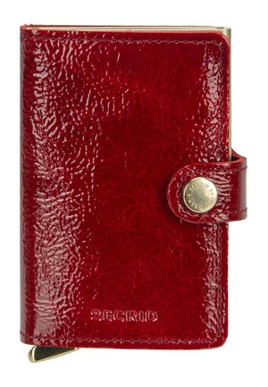 Compact shiny red leather wallet with a snap button closure and embossed brand name "Secrid" on the front.