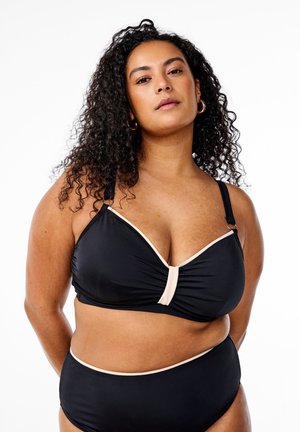 Zwarte bikini met een triangulaire top en beige bies, met een geraffineerd ontwerp en verstelbare bandjes. Hoge taille bikini broek die de top complementeert.