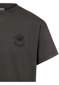 Dark gray cotton t-shirt featuring a round neck, short sleeves, and a circular black graphic with a tree and text on the chest.