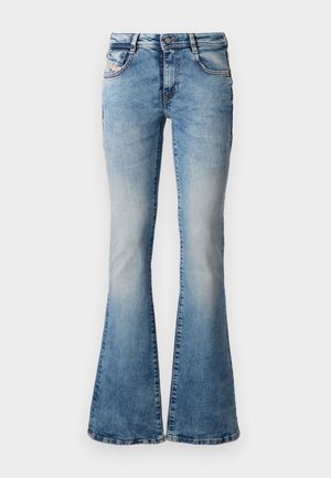 Light blue flared jeans made of denim with a faded wash, five pockets, and belt loops, featuring a button and zip closure.