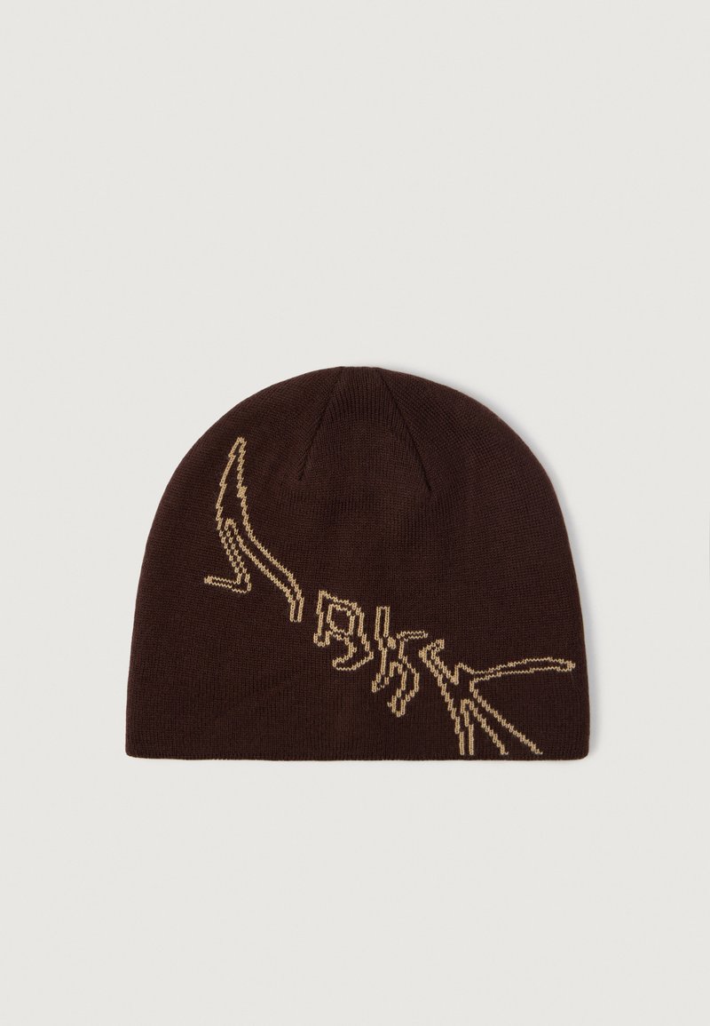 Beanie lavorato a maglia marrone con un design grafico beige a contrasto. Texture morbida con parte superiore arrotondata e orlo a coste, ideale per il calore.