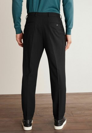 Motionflex Suit Trousers Relaxed FIt - Housut - black