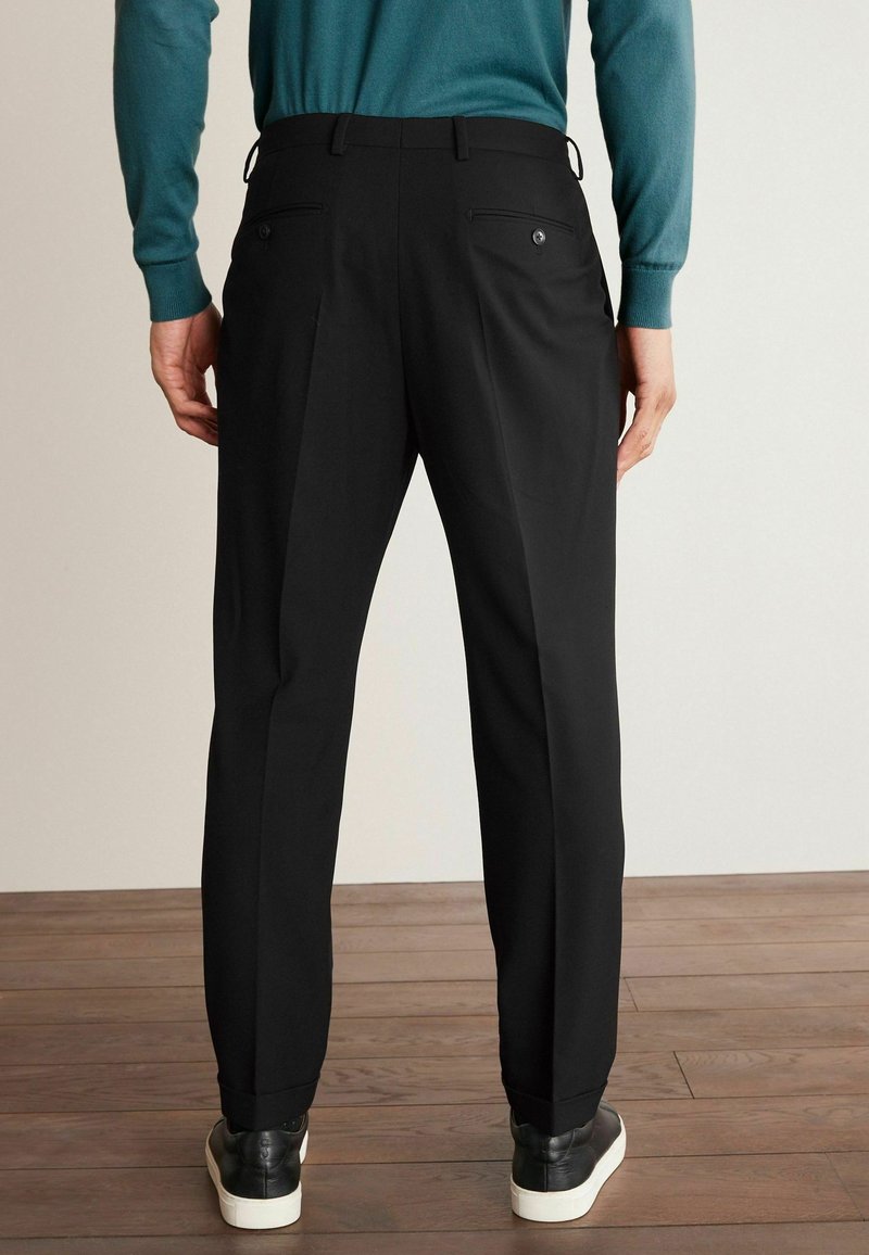 Next Motionflex Suit Trousers Relaxed FIt - Stoffhose - black