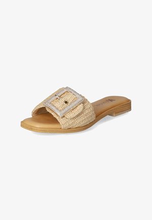 Woven straw slide sandal in beige with a wide strap featuring a decorative silver buckle and soft tan insole. Flat sole with textured finish.