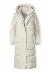 Manteau long rembourré en beige clair, avec capuche, fermeture éclair, boutons pression et poignets côtelés. Texture extérieure lisse avec un motif matelassé.