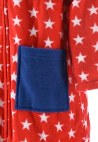 Red fleece robe featuring white star patterns, with a blue pocket on the side, offering soft texture and a cozy appearance.
