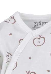 White cotton baby onesie with brown apple prints, featuring a wrap design and snap closure on the front. Soft texture, short sleeves.