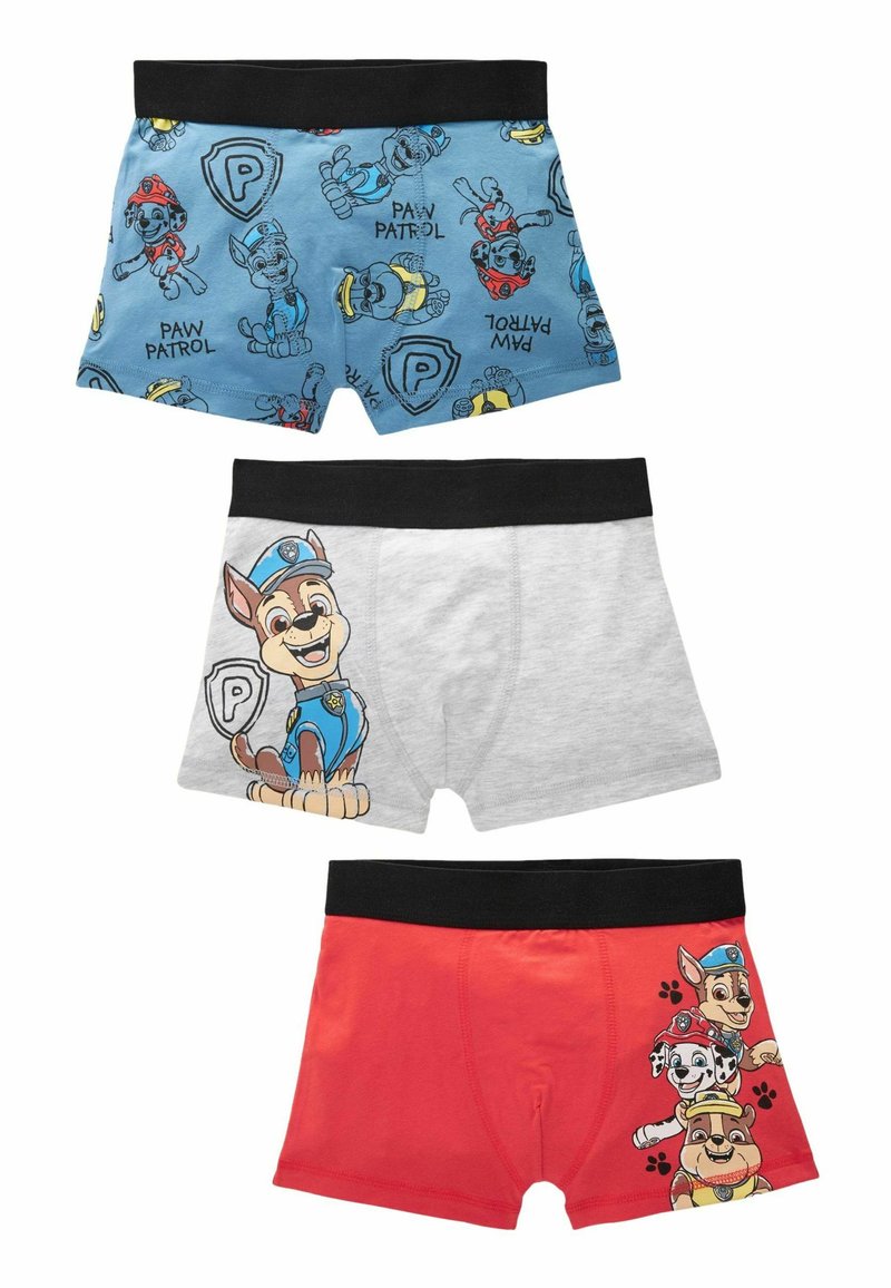 Kolme paria lasten boxer-alushousuja: siniset Paw Patrol -hahmoilla, harmaat koiran kuvalla ja punaiset koirahhahmoilla, kaikki mustilla vyötäröillä.