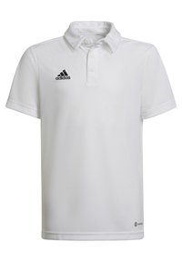 Biała koszulka polo wykonana z gładkiego materiału, z klasycznym kołnierzykiem, trzema guzikami oraz czarnym logo Adidas na lewej piersi.