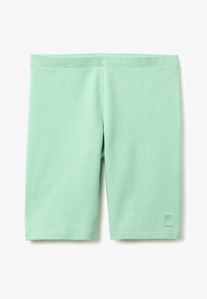 Hellgrüne knielange Leggings mit elastischem Bund und kleinem besticktem Logo nahe dem unteren Saum am rechten Bein.