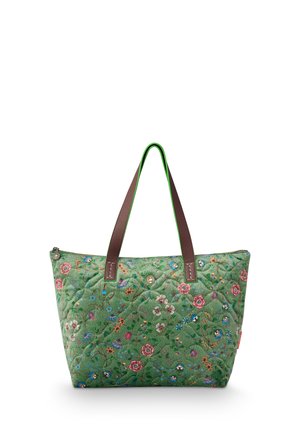 Green tote bag with colorful floral pattern, brown handles, and a small metal button detail at the top center.