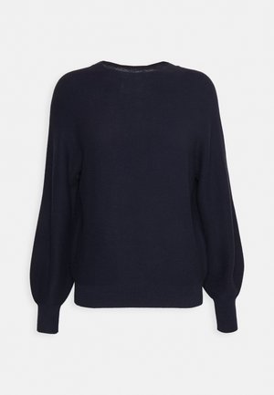 Maglione a maglia blu navy con scollo rotondo, maniche ampie e polsini a coste. Texture morbida con una silhouette rilassata.