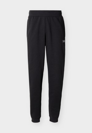 Črne ozke trenirke s širokim elastičnim pasom in manšetami, z majhnim logotipom Under Armour na desnem stegnenem delu.