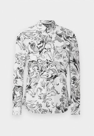 Camicia a maniche lunghe bianca con motivo ornato a spirale nero e grigio, dotata di colletto con bottoni e dettagli di logo discreti.