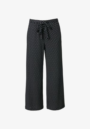 Černé široké kalhoty s bílými puntíky a zavazovacím stahovacím pasem, vyobrazené na bílém pozadí.