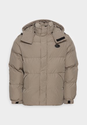 Beige and brown checkered padded winter jacket with hood, front pockets, high collar, and a small black logo patch on the chest.