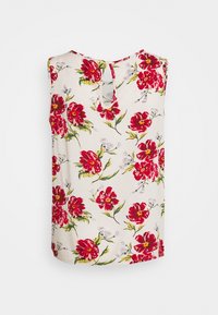 Haut sans manches à fleurs avec des fleurs rouges sur un fond crème, doté d'un détail dos en goutte et d'une texture de tissu lisse.