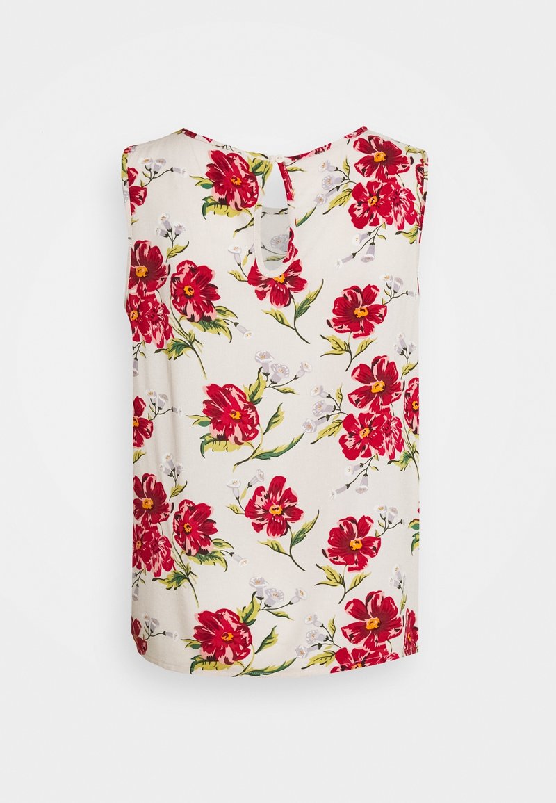 Haut sans manches à fleurs avec des fleurs rouges sur un fond crème, doté d'un détail dos en goutte et d'une texture de tissu lisse.