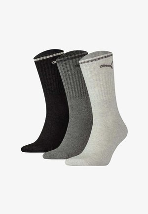 Three pairs of mid-calf ribbed socks in black, dark gray, and light gray with a logo near the top edge on a white background.