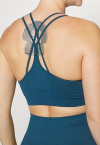 ICANIWILL DEFINE SEAMLESS SCRUNCH BRA - Sujetadores deportivos con sujeción media - teal