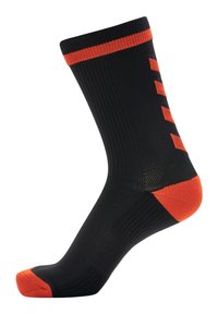 Calzino nero con accenti arancioni. Presenta una texture a coste, un design di colore solido e una punta rinforzata. Strisce arancioni verticali sui lati.