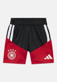 Mustad musta ja punase värvi spordilühikesed püksid, millel on elastne vöökoht, valged ja mustad külgtriibud, tekstureeritud punane paneel ning Saksamaa Jalgpalliliidu logo.