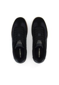 Black sneakers with suede and mesh upper, lace-up design, rounded toe, and a textured rubber sole. Logo tag on tongue.