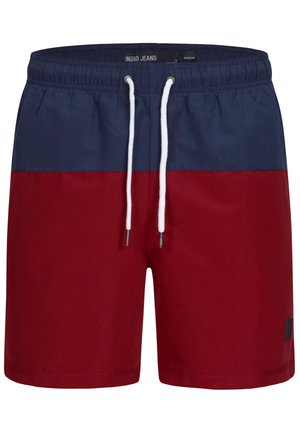 Rote und marinefarbene, colorblock Badehosen mit einem verstellbaren Bund und Seitentaschen. Glattes Material mit strukturiertem Finish und einem markierten Patch-Detail.