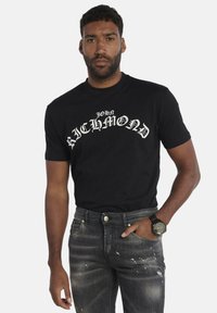 T-shirt con stampa - black