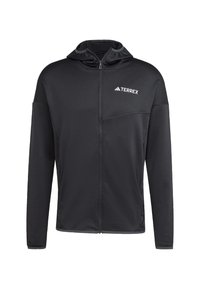 Black Terrex zip-up hoodie made from lightweight fabric. Features a hood, long sleeves, and a chest pocket with contrasting zipper details.