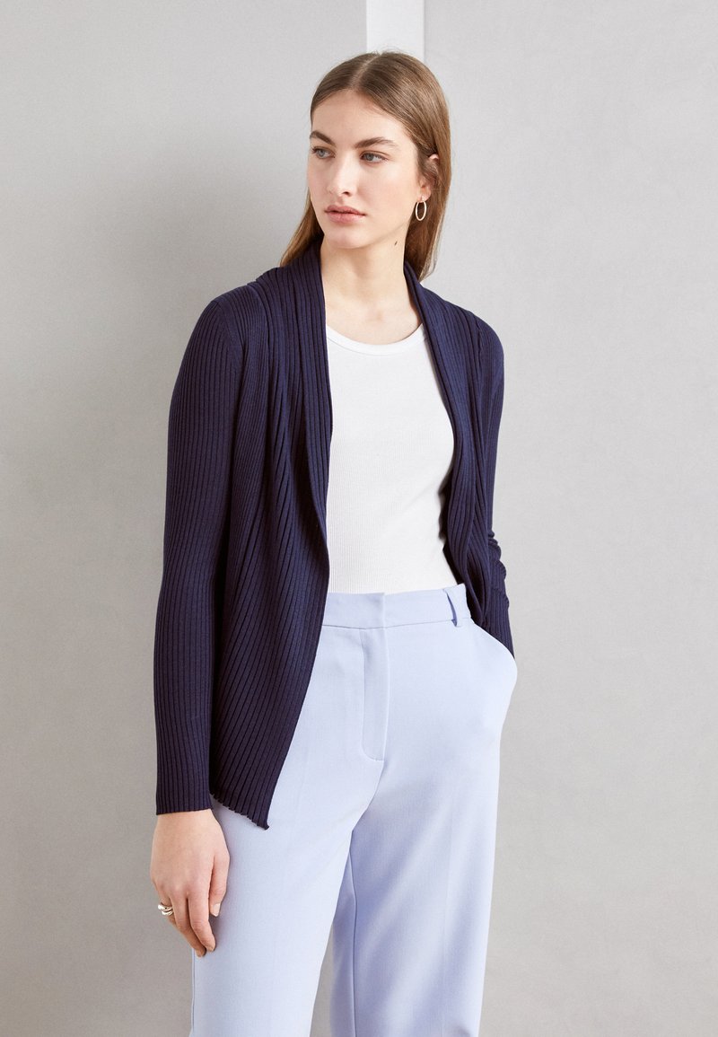 Cardigan ajusté en laine - Bleu clair - FEMME | H&M FR
