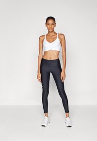 Under Armour LOW BRA - Light support sports bra - white/black
