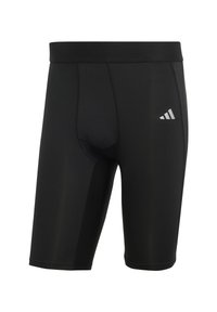Schwarze Sportshorts aus elastischem Material, mit taillierter Passform, elastischem Bund und einem kleinen weißen Logo auf der linken Seite.
