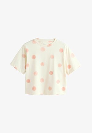 Cremefarbenes kurzärmeliges, kurzes T-Shirt mit rundem Ausschnitt und verstreuten weichen rosa Punkten.