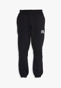 Sorte sweatpants med elastisk talje og manchetter, med et grafisk print på venstre side. Fremstillet af blødt, strækbart materiale for komfort.